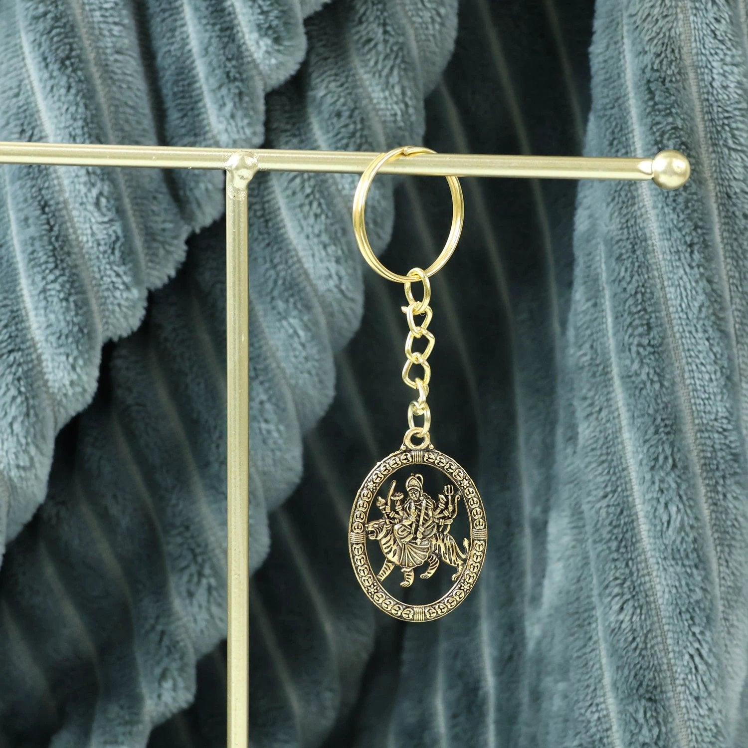 Maa Durga Oval Frame Golden Keychain by Wukusy