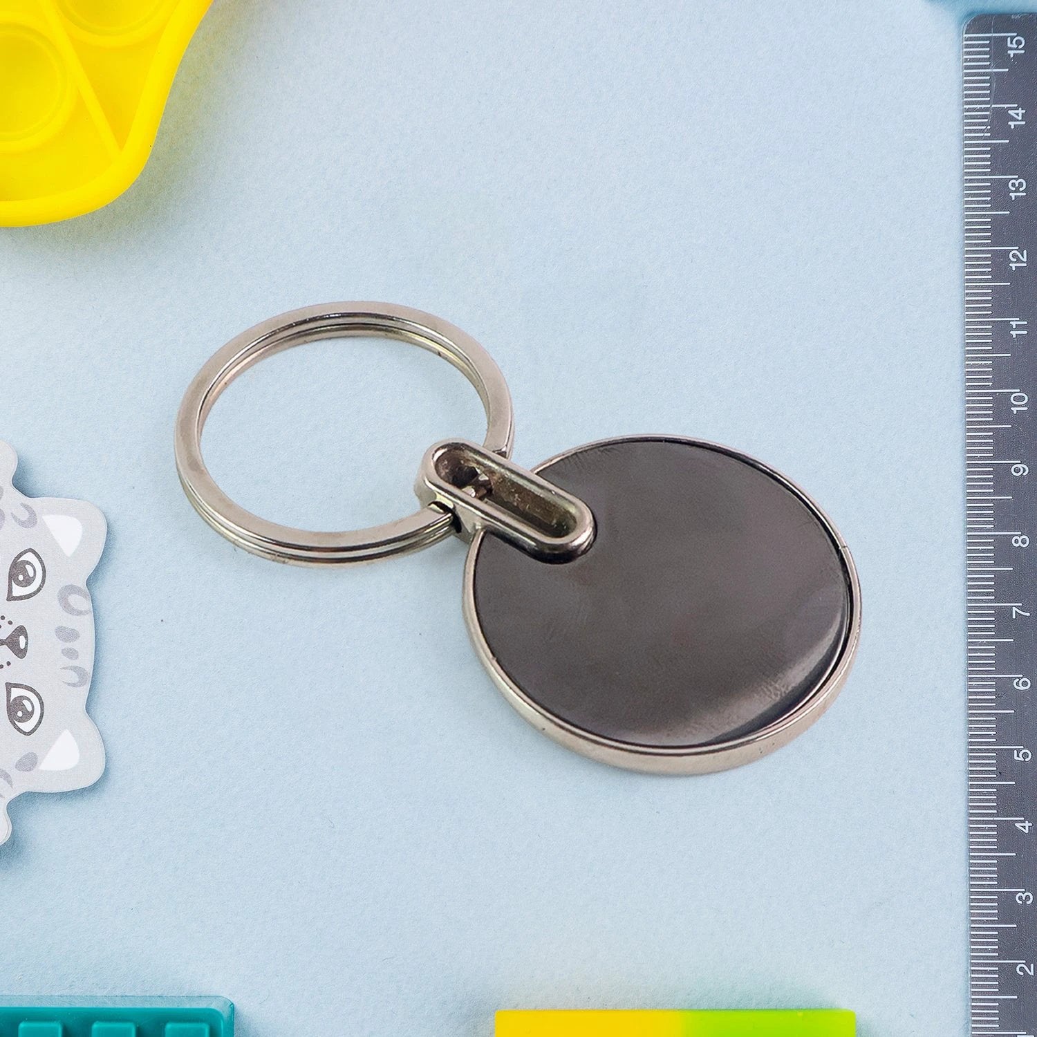 Black Round Metal Keychain by Wukusy