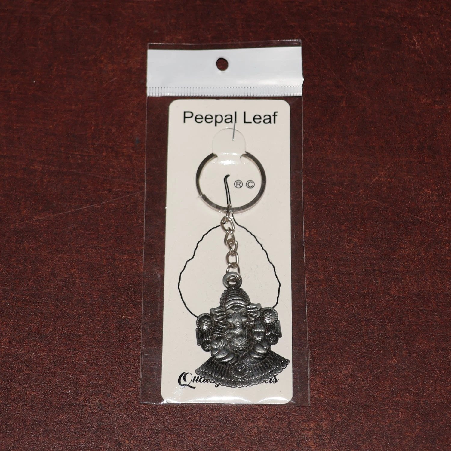 Lord Ganesha Sitting Design Silver Keychain by Wukusy