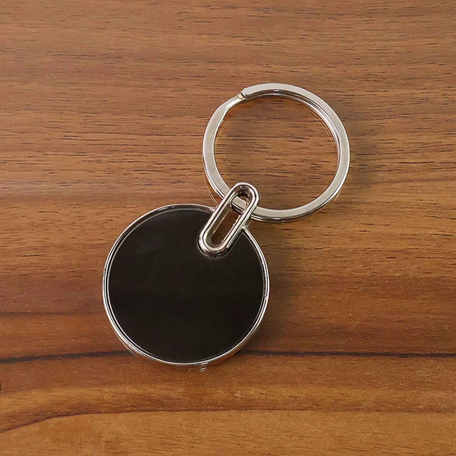 Black Round Metal Keychain by Wukusy